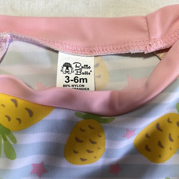 3-6M Ruffle Butts rash guard/swim top - Picture 3 of 3